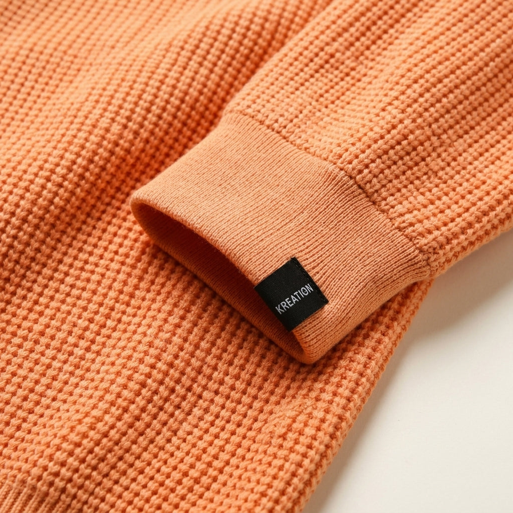 Detail close-up of Krischen Peach Knit set fabric texture