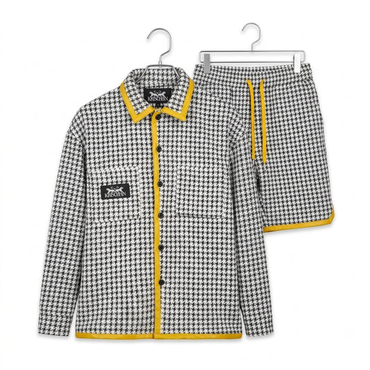 Studio display of Houndstooth Classic Jacket and Shorts set with yellow leather trim on a hanger